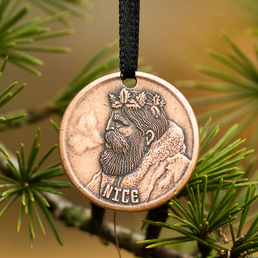 Copper coin ornament of Krampus and Father Christmas/Saint Nicholas by Shire Post Mint