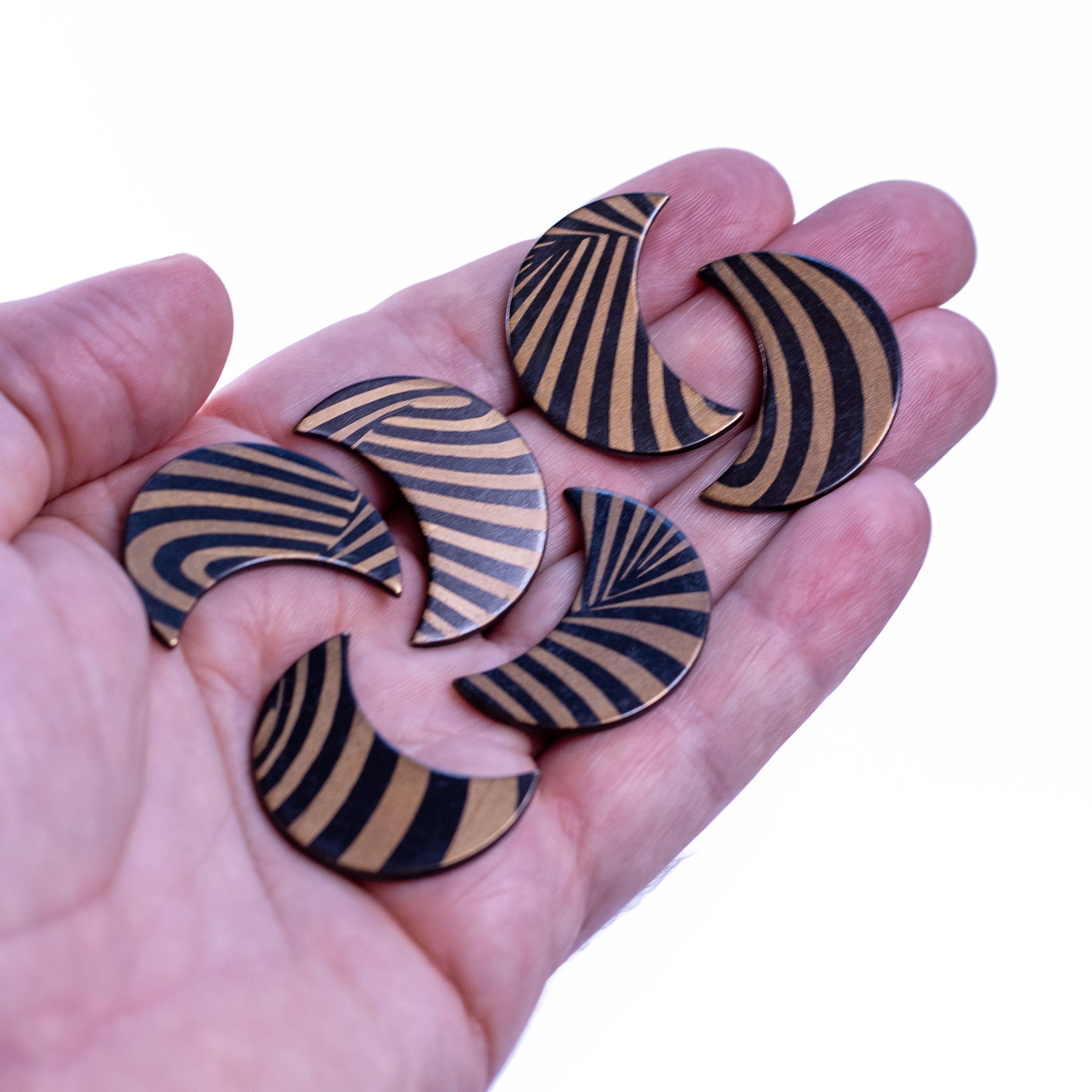 Shire Post Mint Bronze Crescent Puzzle Pieces