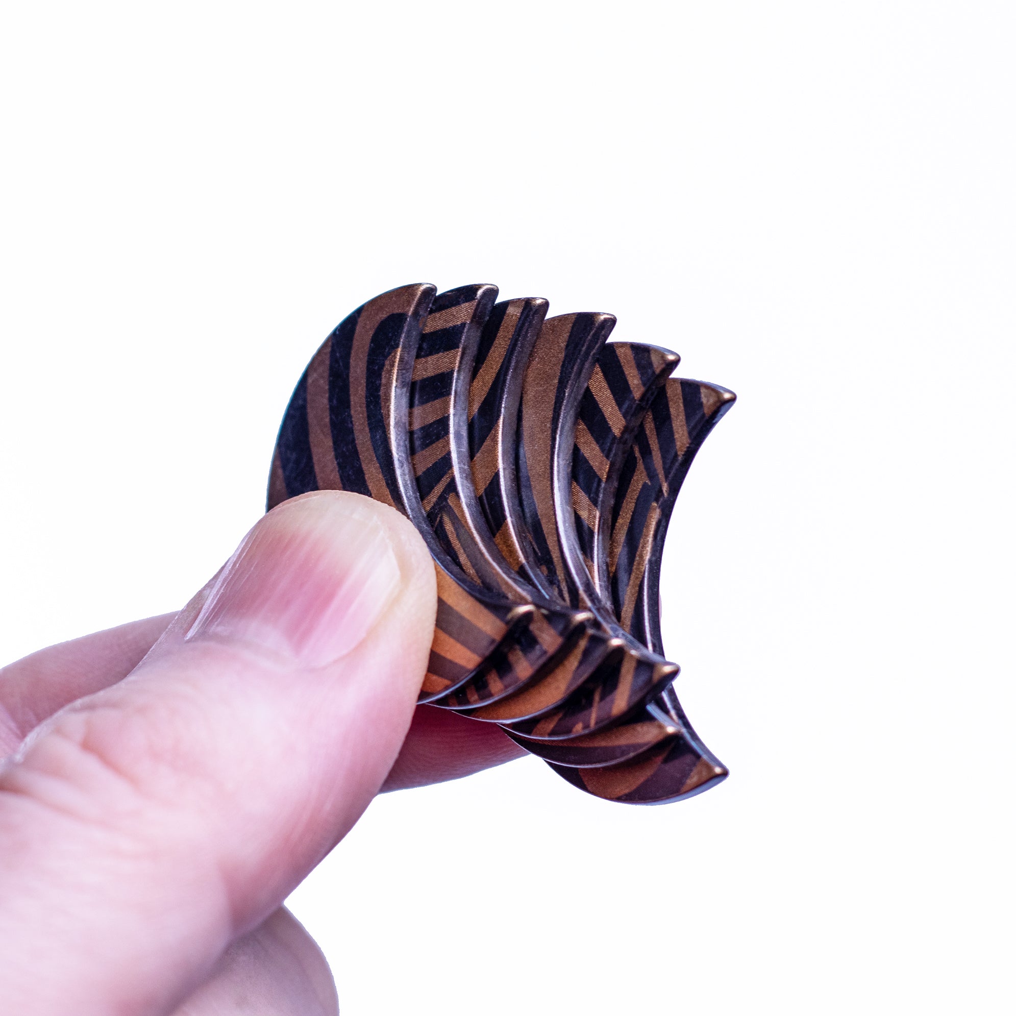 Shire Post Mint Bronze Crescent Puzzle Pieces