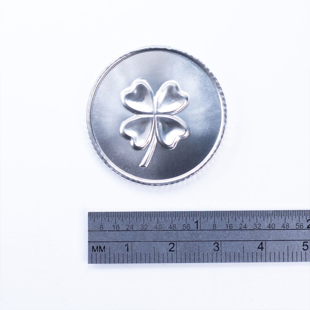 Lucky Silver Coin with Four Leaf Clover and Horseshoe