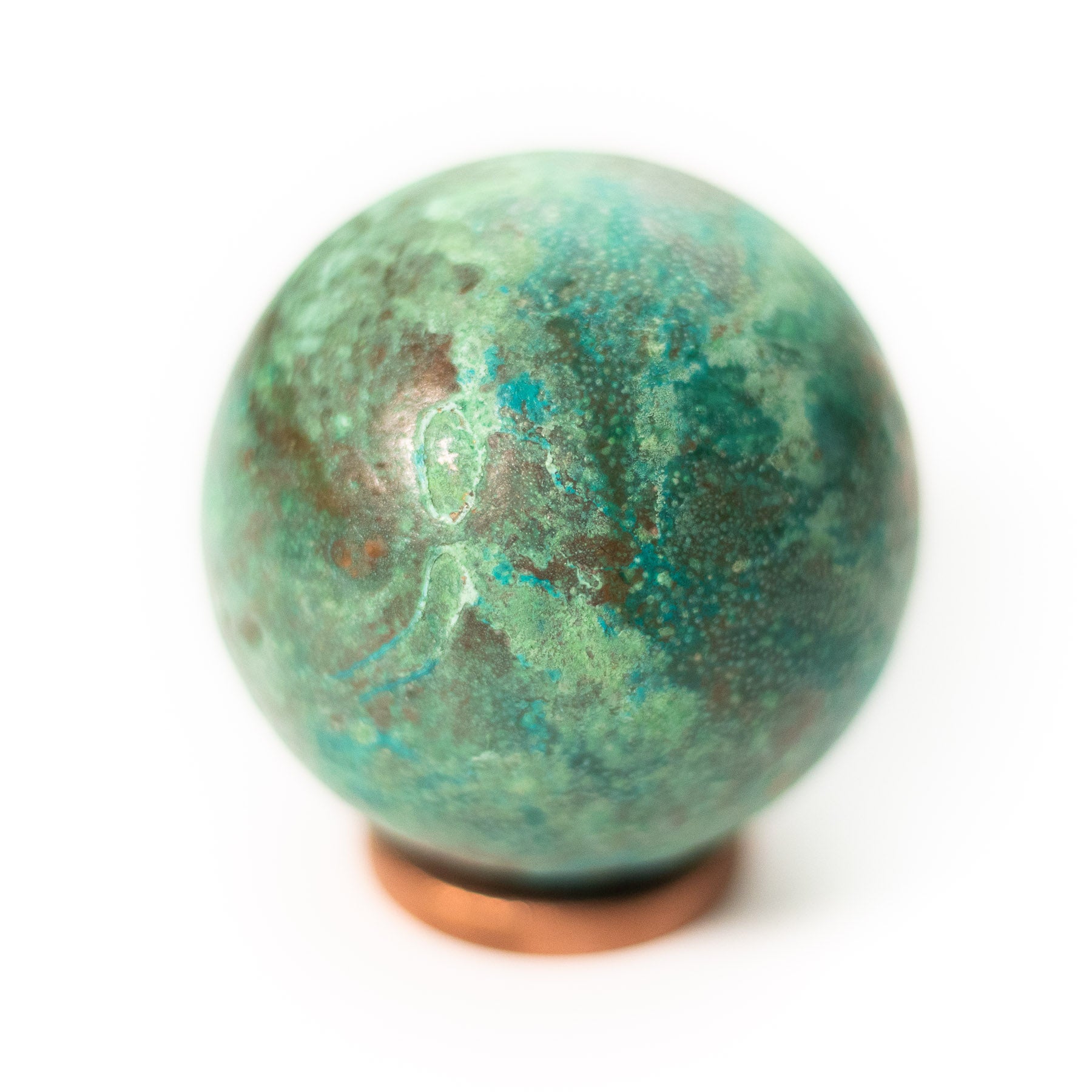 Verdigris cast copper orb by Shire Post Mint