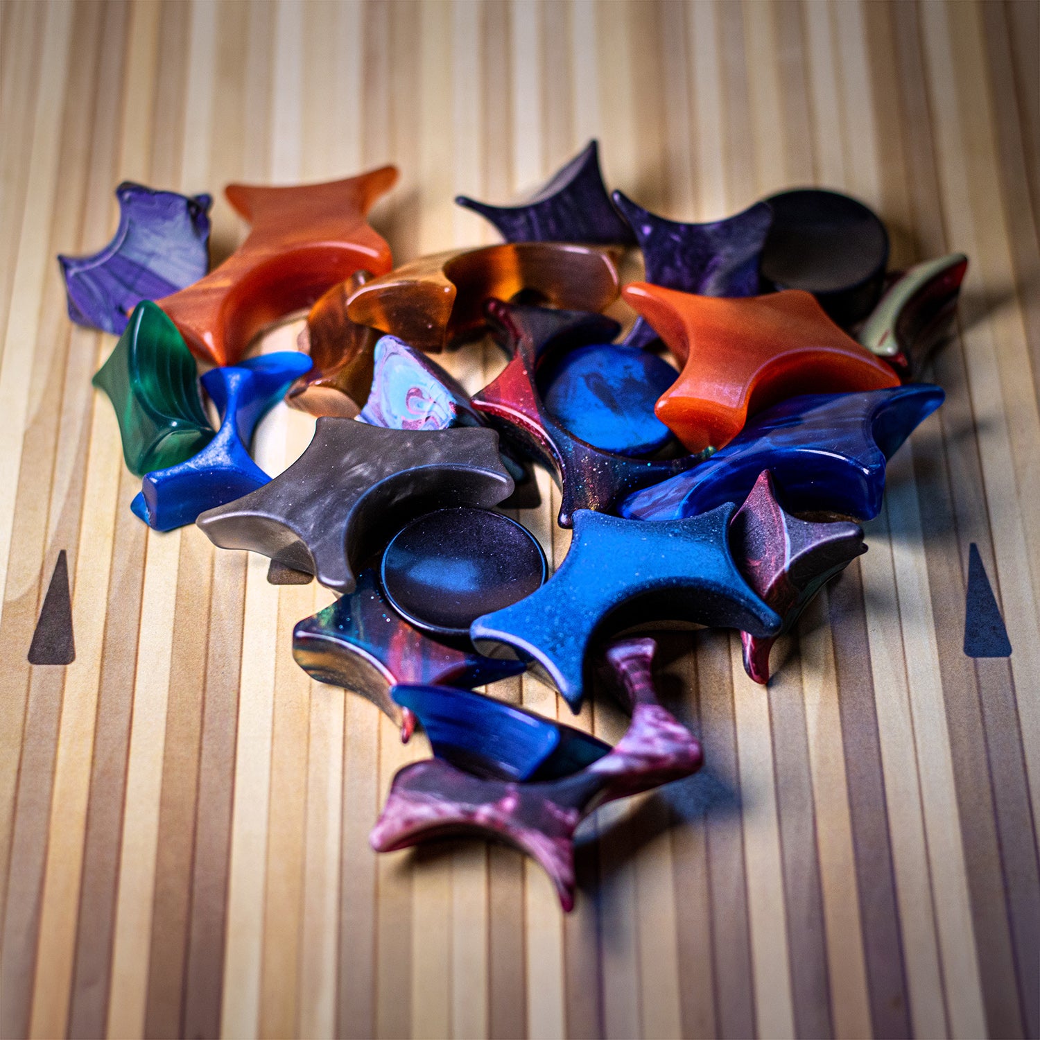 Pile of colorful Shire Post Mint Bowlerite Fidget Chunks