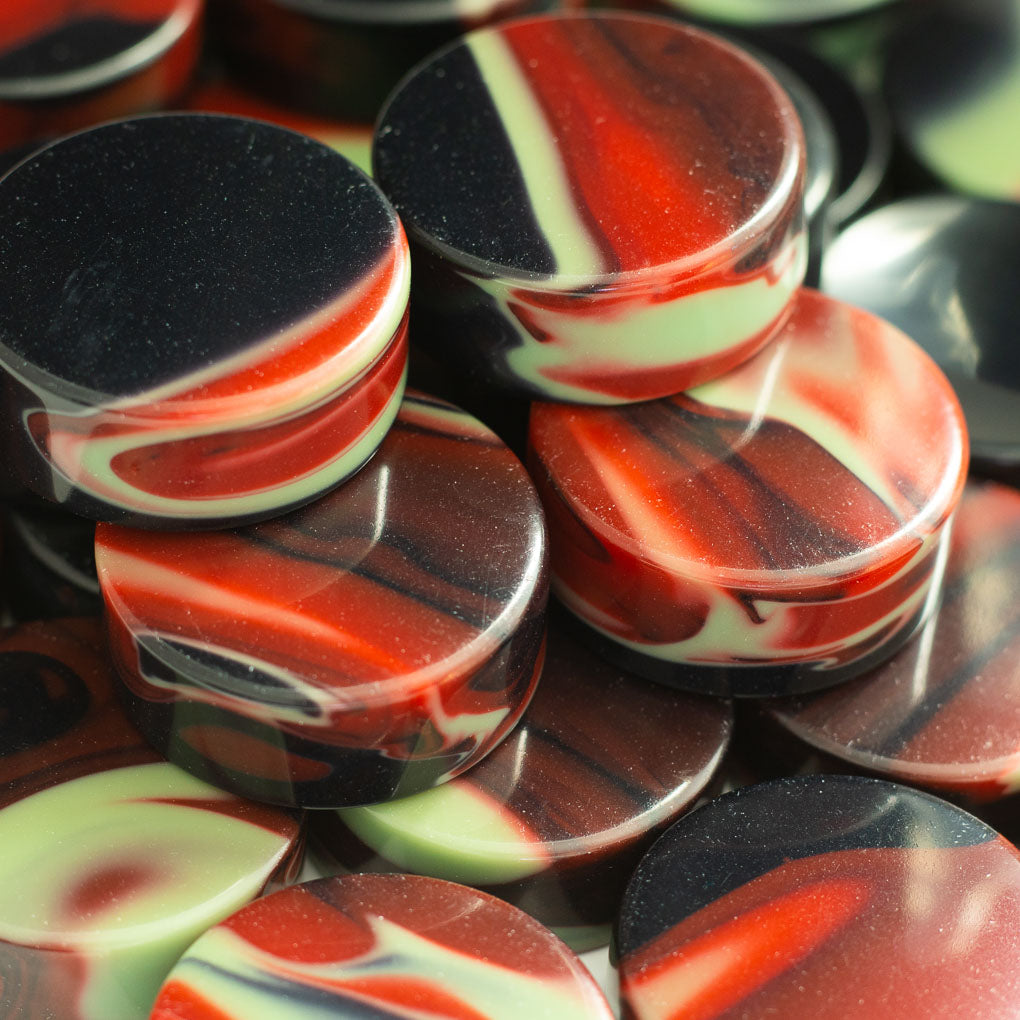 "Betelgeuse" Black Red and Jade Upcycled Bowling Ball Worry Stone